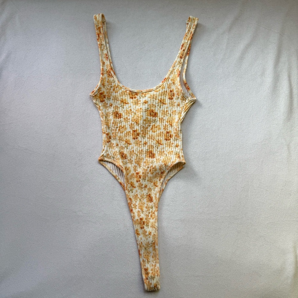 HEAVY MANNERS “HITCHIN A RIDE” BODYSUIT SIZE SMALL